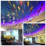 Stranded Fish - iridescent swirls of hand-blown glass fish Hanging sculptures and wall art for a hotel restaurant-2